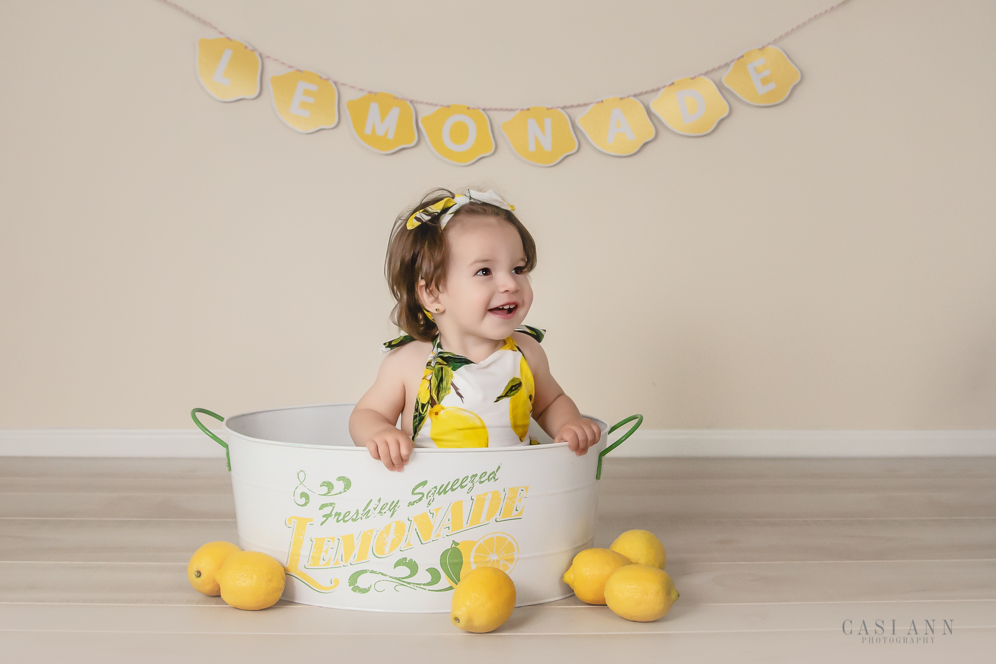 L's Birthday Cake Smash Session, mommy and me, daddy and me, sisters, siblings, girls, birthday, Studio Sitter Session, Watch Me Grow, Baby, Child, Photography, Session, Casi Ann Photography, studio, 12 month, milestone, sitter, 1 year, romper, vines, lemons, Ingleside, Lindenhurst, Illinois, portrait, kids, 3 years